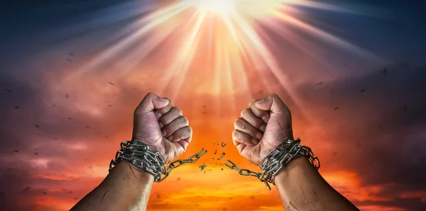Hands Breaking Chains